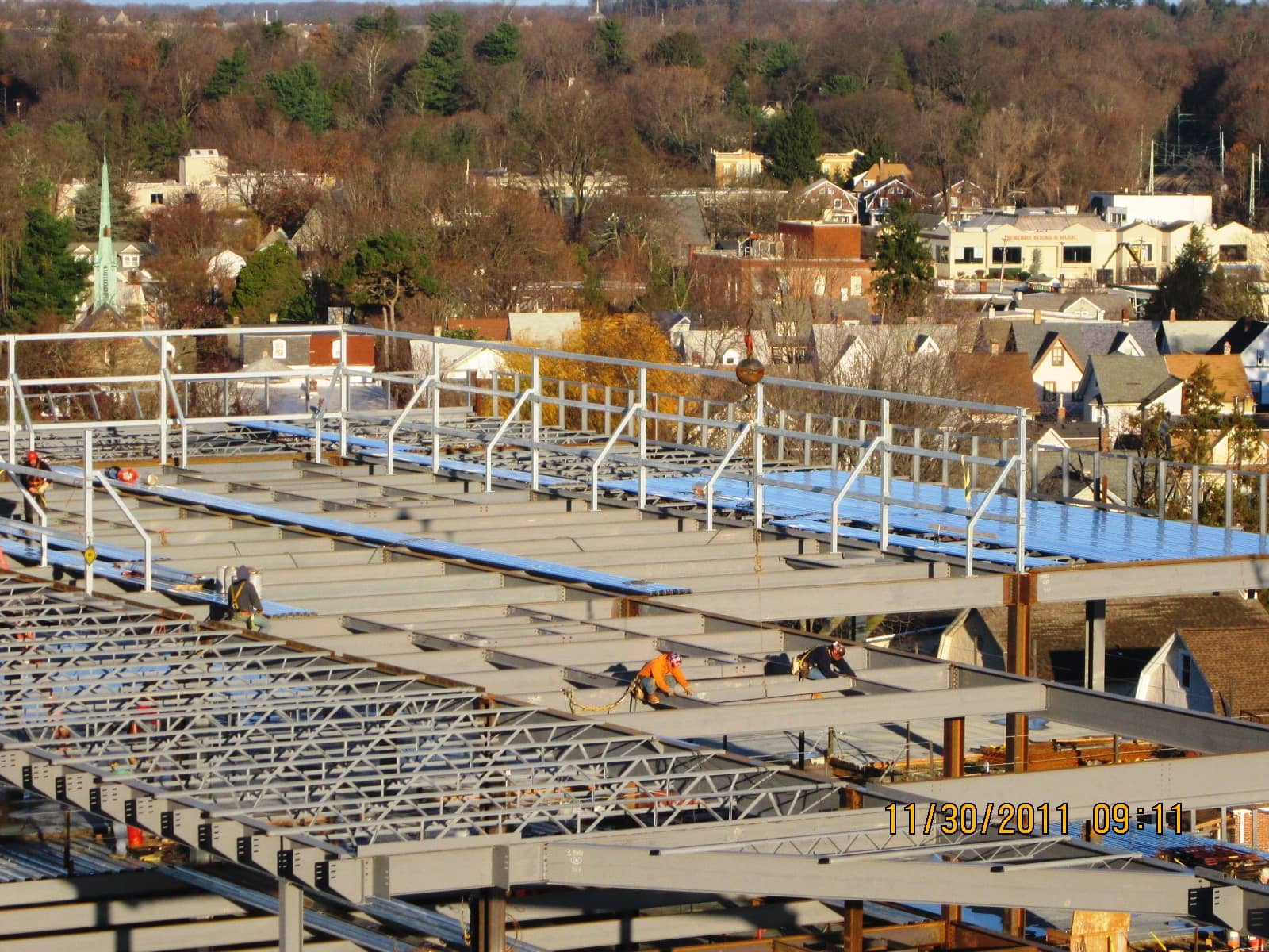 Mid Atlantic Construction About Roots team working on roof